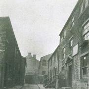 THIS old view of what came to be known as Baptist Square – near the bottom of West Lane – illustrates the earlier years of the baptists in Keighley, with their Turkey Street Chapel on the right and their Sunday School on the left.