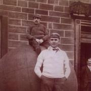 FRED Dixon, the tallest man in Silsden, stands in 1930 outside the King's Arms in front of a giant push-ball with his friend Jimmy Scott, Silsden's smallest man, perched on top.