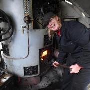 Steam Gala KWVR. Grafton Steam Crane at Oakworth as Margaret Bonner stokes the boiler.