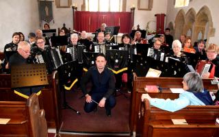 The Craven Accordion Orchestra who gave their services for free at a recent charity concert in Castle Bolton.