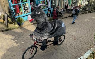 The panto pony makes its way up Main Street, Haworth