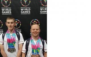 James Crossley, left, and Chris Woodhead with their Los Angeles Special Olympics medals