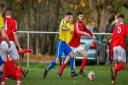 Salts' Sam Waterhouse (yellow, on the ball) netted in the last round when his side won at Calverley United Picture: Andy Garbutt