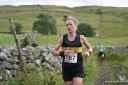 Elsie Butler crossed the line first at Arncliffe in the women's race. Pic by: Dave/Eileen Woodhead