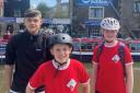 Thomas, left, Harrison and Lily, who have been chosen to take part in a Scouts trip to Canada