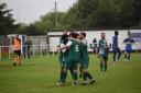 Steeton celebrate one of their five goals against Squires Gate.