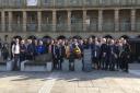 Laying flowers at the Anne Lister statue in the Piece Hall, Halifax at the 2022 Anne Lister Memorial Weekend