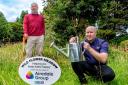 Parish councillor Stewart Anthony and Daniel Marr of Airedale Group in the new wildflower area