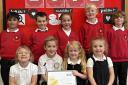East Morton Primary School pupils with the award