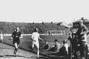 Olympic champion Eric Liddell winning a race at Ibrox Park, Glasgow