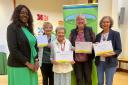 Foluke Ajayi, chief executive of Airedale NHS Foundation Trust, presents certificates to volunteers – from left – Marylyn Minikin, Maeve Rock, Jill Wright and Rose Chapman
