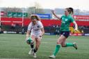 Ellie Kildunne scores for England in their Women's Six Nations win over Ireland last April.
