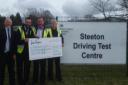 The Steeton Driving Test Centre team with its cheque for Manorlands, from left, manager Kerry Nicholson, Carwyn Huntley, Rob Lawler and Karen Place