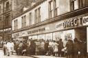 Bargain-hunters queue for the closing-down sale at the Direct Walk Round Store in Cooke Lane in 1966
