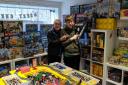 Voyage Care resident Daniel with his support worker Paul Jennett in the Bric-Kit Lego shop in Cross Hills
