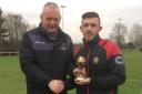 Niall Sultan receives his November player of the month award from league media officer Ian Templeman     Picture: Hallmark Security League