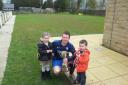 Craig Durn is pictured with his children Georgia and Thomas after Crossflatts won the Keighley Cup in 2011-12