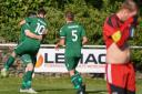 Steeton Reserves celebrate scoring one of their goals in their 3-2 win over Lower Hopton