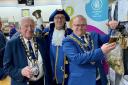 Pulling a pint – Mayor of Kidderminster, Cllr Darren Chambers (right), with Stourport Mayor Cllr Mike Freeman and Kidderminster Town Crier Steve Day