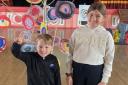 Children with some of the artwork during the exhibition at Victoria Hall