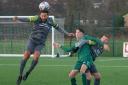 Steeton (green) fought hard, but it was Nelson who came out on top in a tough battle in the end. Picture: John Chapman.