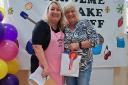 Julie Wood of Denholme Youth Cafe with Jennie Smith, winner in the cake category