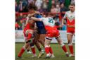Lloyd Roby (21) puts in a tackle for Cougars in their home defeat to Toulouse last season.