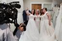 Friends try on bridal gowns during Cinderellas 'Real Women Week