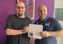 First Keighley customer Howard Flett with Brsk community manager Mohammed Amran
