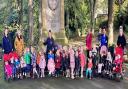 Youngsters from Bridge House at Steeton war memorial