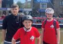Thomas, left, Harrison and Lily, who have been chosen to take part in a Scouts trip to Canada