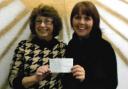 Carole Ogden, left, presents the cheque to the Rev Natasha Thomas