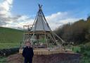 George Clarke in front of the tepee