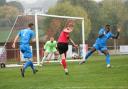 Luke Brooksbank (red) scored twice against Silsden's derby rivals Eccleshill United on Saturday.