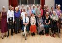 Past and present members attend a 70th-anniversary dance