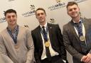Gold medal winner Harry Pullan, centre, with two fellow WorldSkills UK finalists