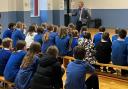 MP Robbie Moore talks to pupils at Haworth Primary School