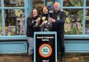 Celebrating the award at Wave of Nostalgia: from left, shop manager Heather Thompson and Diane and Ian Park