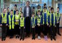 MP Robbie Moore with pupils during his visit to Long Lee Primary School