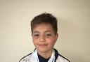 City of Bradford Swimming Club's Freddy Dean won two silver medals and a bronze at Ponds Forge.