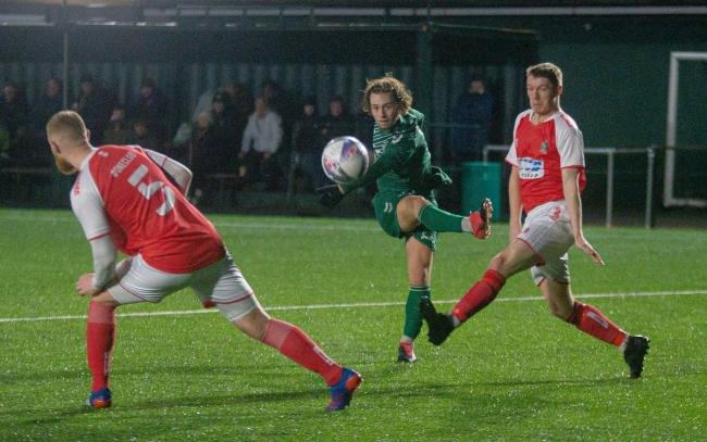 Kayle Price (centre) netted in injury-time to seal Steeton's superb win at the weekend. Picture: John Chapman.