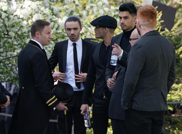 Keighley News: The members of The Wanted (left to right) Max George, Jay McGuiness, Siva Kaneswaran and Nathan Sykes (partially hidden) arrive for the funeral of The Wanted star Tom Parker. (PA)