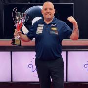Chris Melling, seen here lifting the Champions League Pool trophy last year, has gone out at the last-16 stage this time around. Picture: Ultimate Pool.
