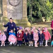 Youngsters from Bridge House at Steeton war memorial