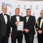 Pictured, from left, at the awards ceremony are West Yorkshire Lord Lieutenant Ed Anderson, Andy Spence and David Key of Phoenix Security, and Commodore Phil Waterhouse