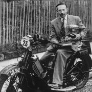 Captain Tom Moore on his Scott Flying Squirrel motorcycle