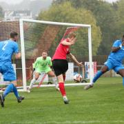 Luke Brooksbank (red) scored twice against Silsden's derby rivals Eccleshill United on Saturday.