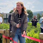 Katie Rushworth performs the ribbon-cutting ceremony