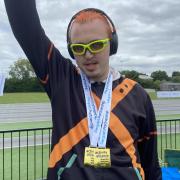 Dylan celebrates his medals success