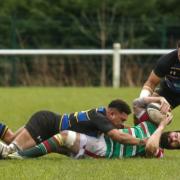 Sean Kelly (green) helped himself to a second-half try but was injured in the process of scoring.